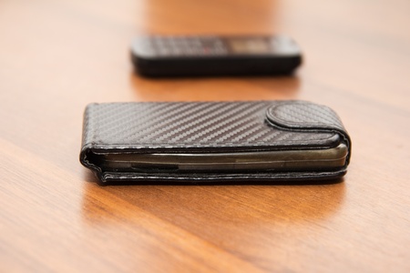 cell phone on a wooden backgroundの写真素材