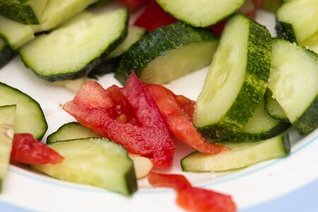 sliced ââcucumbers and tomatoesの写真素材