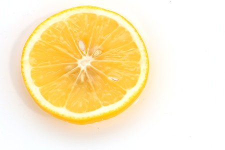 lemon in water on a white backgroundの写真素材