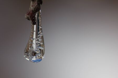 a drop of ice in nature. macro