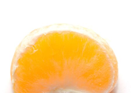 Juicy tangerine on a white backgroundの写真素材