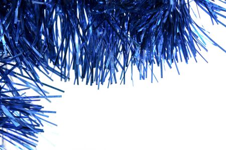 blue tinsel on a white backgroundの写真素材