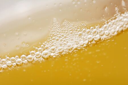 background of yellow beer. macro