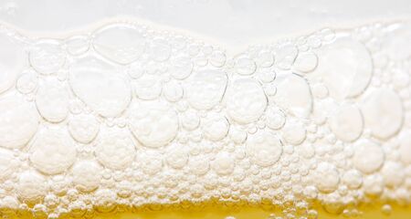background of yellow beer. macroの写真素材