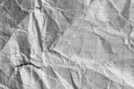 crumpled white paper as a backgroundの写真素材