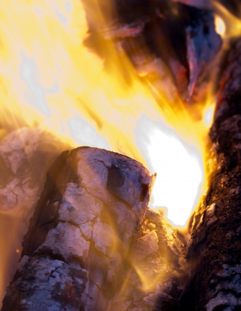 burning charcoal in the background