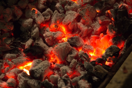burning charcoal in the backgroundの写真素材