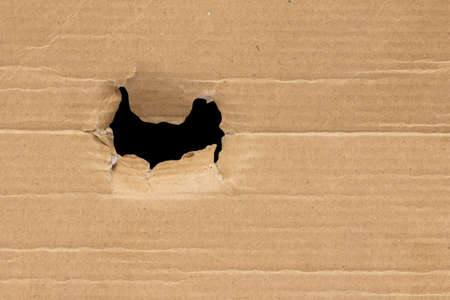 black hole in a cardboard backgroundの写真素材