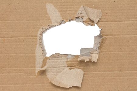 white hole in a cardboard backgroundの写真素材