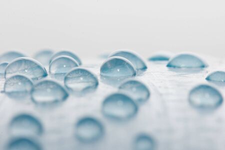 drops of water on a blue background. macro
