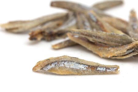 salted anchovies on a white backgroundの写真素材