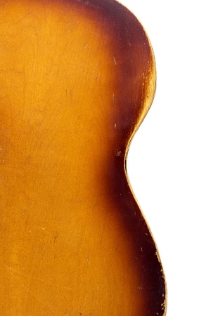 old wooden guitar on a white backgroundの写真素材