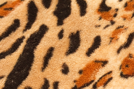 background from a fabric tiger skin