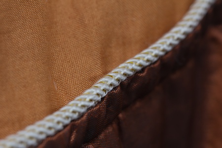 Background of golden fabric. textureの写真素材