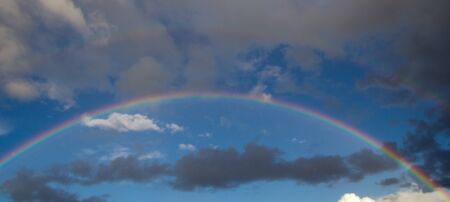 rainbow in the sky on the natureの写真素材