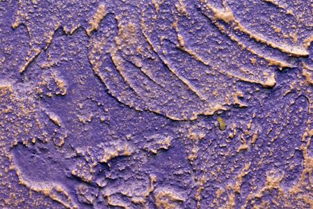 Abstract background of a purple plaster wallの写真素材