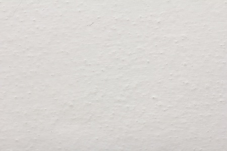 background of a white wall painted with limeの写真素材