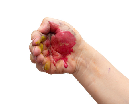 hand in watercolor paint on white backgroundの写真素材