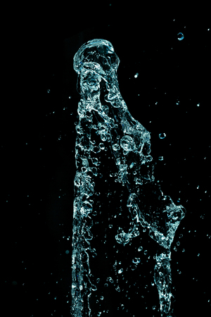 Water splashes on a black backgroundの写真素材