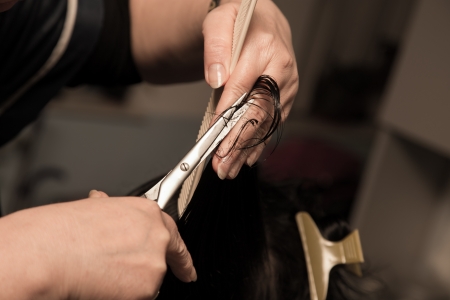 Women's haircut at the barber scissorsの写真素材