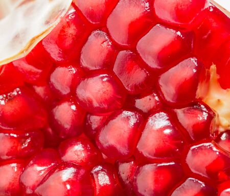 Macro view of ripe seeds of pomegranateの写真素材