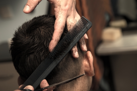 Men's haircut at the barber scissorsの写真素材