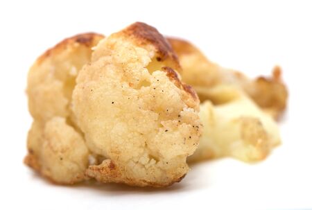 fried cauliflower on a white backgroundの写真素材