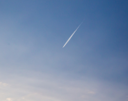 trace of the aircraft in the skyの写真素材