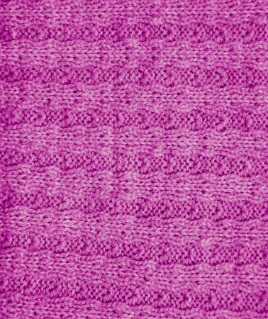 pink knitted fabric as a background. macroの写真素材