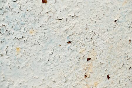 background of an old wall with cracked paint