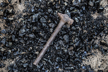hammer on a black resin