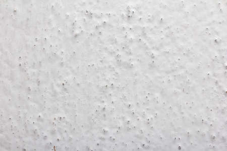 background of a white wall painted with lime