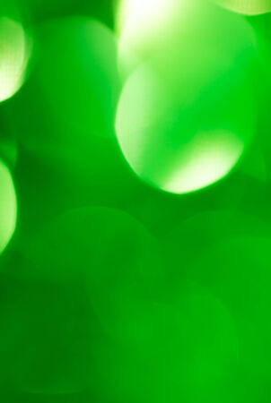 festive green bokeh as backgroundの写真素材