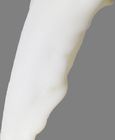 milk on a gray backgroundの写真素材