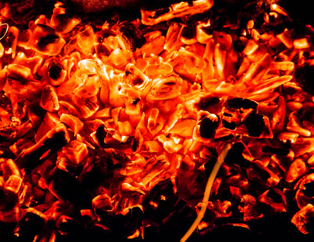 abstract background. burning charcoals with sparksの写真素材