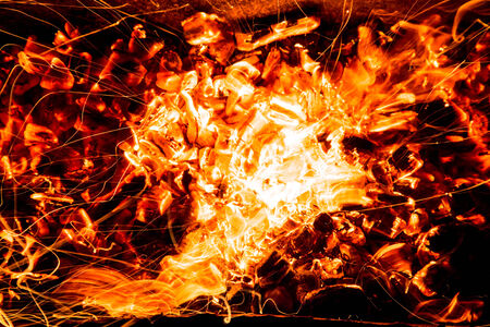 abstract background. burning charcoals with sparks