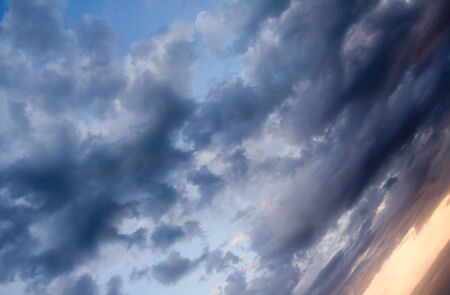 beautiful clouds at sunset as backgroundの写真素材