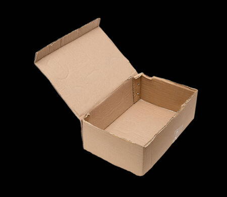 cardboard box on a black background