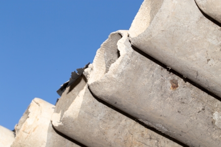 asbestos cement pipes against the blue skyの写真素材