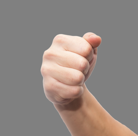 hand on a gray backgroundの写真素材