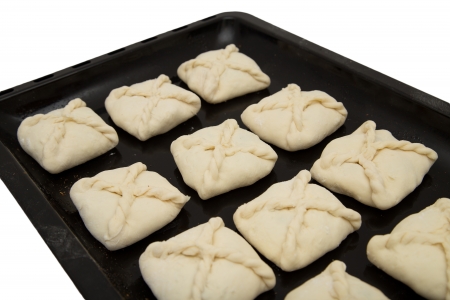 pies with meat on black panの写真素材