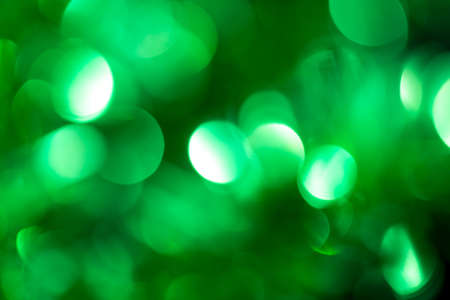 beautiful holiday background of green bokehの写真素材