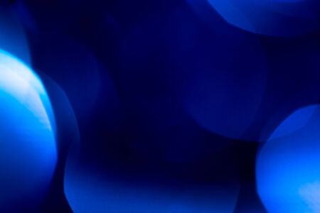 beautiful holiday bokeh background of blueの写真素材