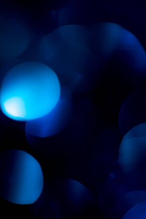 beautiful holiday bokeh background of blueの写真素材