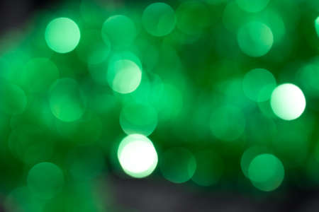 holiday background of green bokehの写真素材