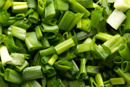 background of chopped green onions. macro