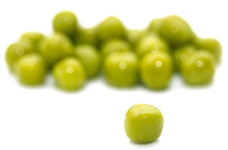 green peas on a white background. macroの写真素材
