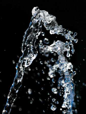 water splashes on a black backgroundの写真素材