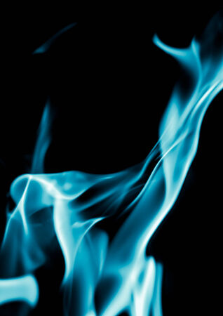 abstract background of blue flame fire on black backgroundの写真素材