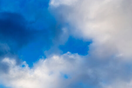 Beautiful clouds on a blue sky as backgroundの写真素材